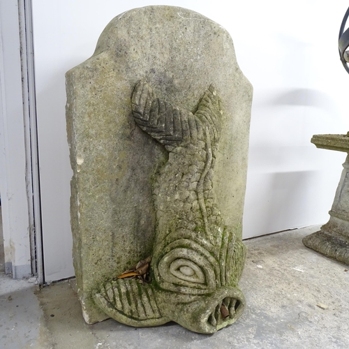 2642 - A weathered carved stone fish water fountain. 60x85x30cm.