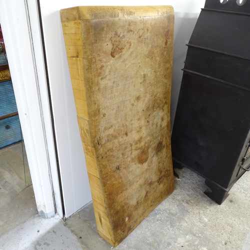 2646 - An antique butcher's block (lacking stand). 60x125x17cm