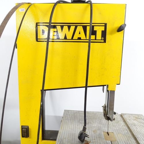 2649 - A Dewalt upright bandsaw, on stand with three blades. Overall 80x158x70cm