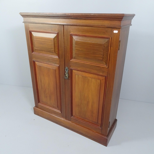 2058 - A modern mahogany two door cabinet. 88x104x30cm.