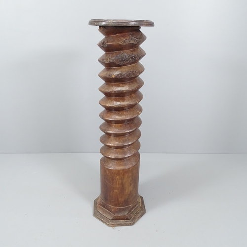 2063 - A French elm spiral turned column with circular top, on octagonal base. 30 x 110cm.