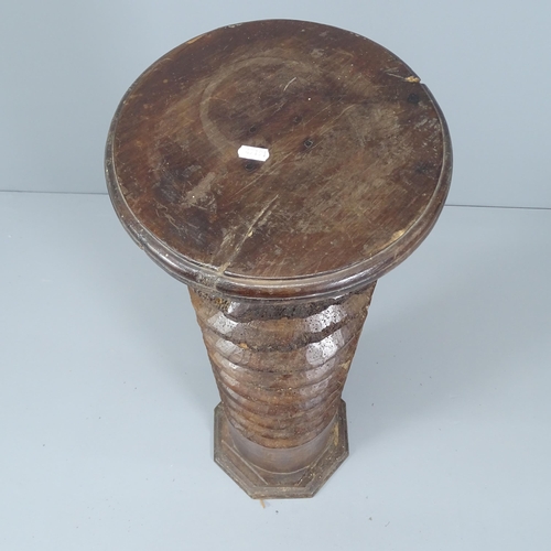 2063 - A French elm spiral turned column with circular top, on octagonal base. 30 x 110cm.