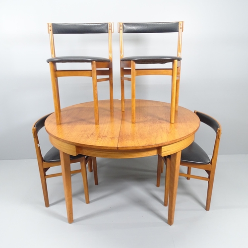 2070 - A mid-century Mackintosh draw-leaf dining table, 120 (extending to 200)x74cm, and four matching chai... 