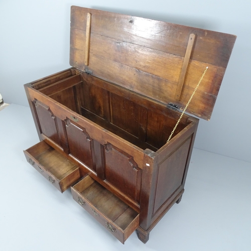 2078 - An antique oak mule chest. 149x92x55cm.