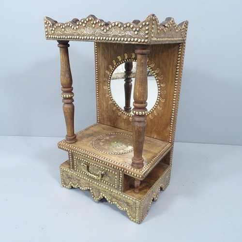 2097 - A vintage Indian oak Mandir temple cabinet with copper and brass decoration. 37x65x27cm