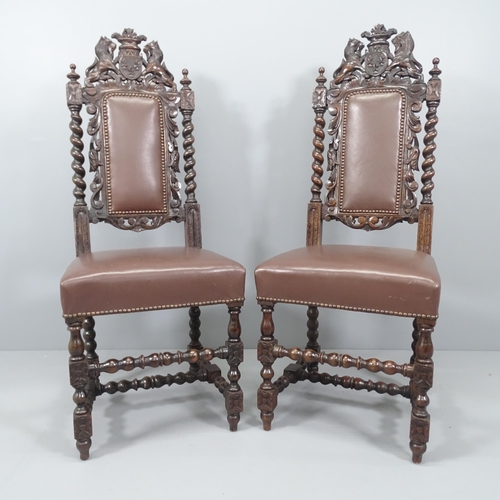 2098 - A pair of oak and faux-leather upholstered Carolean style hall chairs, with carved decoration, barle... 