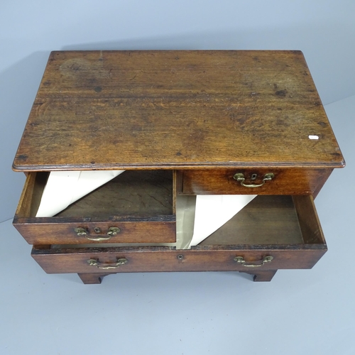 2106 - A 19th century oak chest of two short and three long drawers, raised on bracket feet. 87x87x52cm.