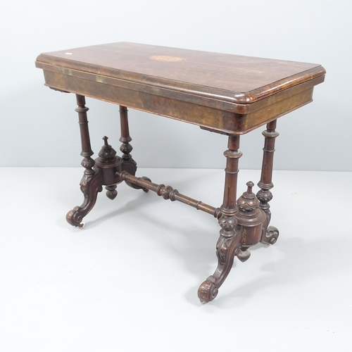 2111 - A 19th century mahogany fold-over card table. 94x71x45cm