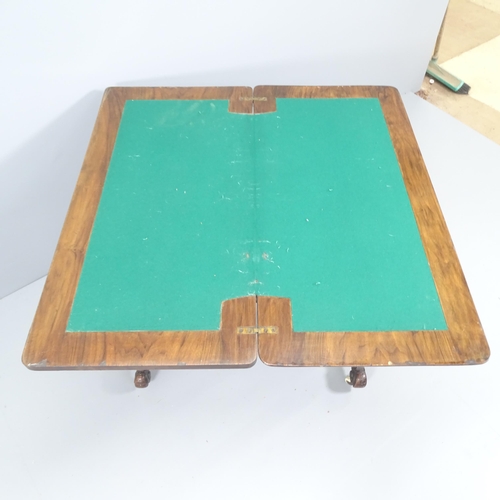 2111 - A 19th century mahogany fold-over card table. 94x71x45cm