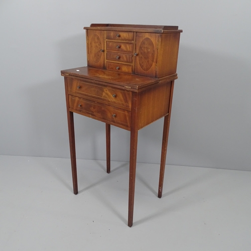 2118 - An Edwardian mahogany ladies' writing desk, with raised fitted back, fold-over top and drawers under... 