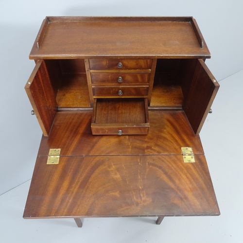 2118 - An Edwardian mahogany ladies' writing desk, with raised fitted back, fold-over top and drawers under... 