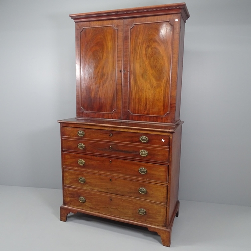 2124 - A George III mahogany secretaire bookcase, the top section having four adjustable shelves, the lower... 