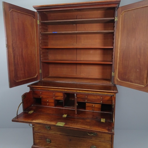 2124 - A George III mahogany secretaire bookcase, the top section having four adjustable shelves, the lower... 