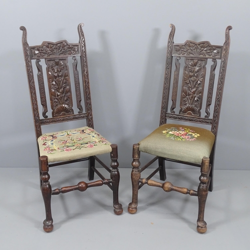 2131 - A pair of 19th century carved oak and tapestry upholstered hall chairs.