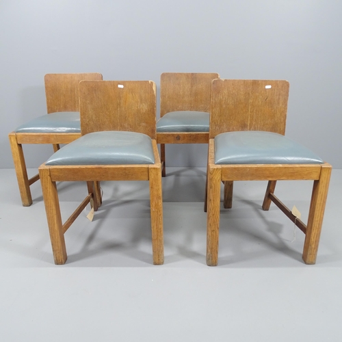 2144 - A set of four 1930s oak framed low back dining chairs with drop in seats.