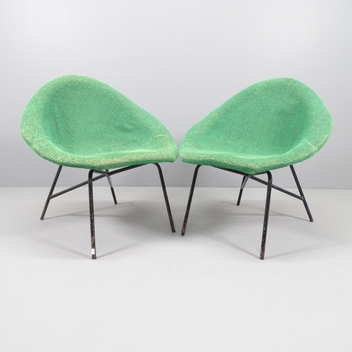 2146 - A pair of mid-century Italian saucer shaped lounge chairs, upholstered fibreglass shell on black tub... 