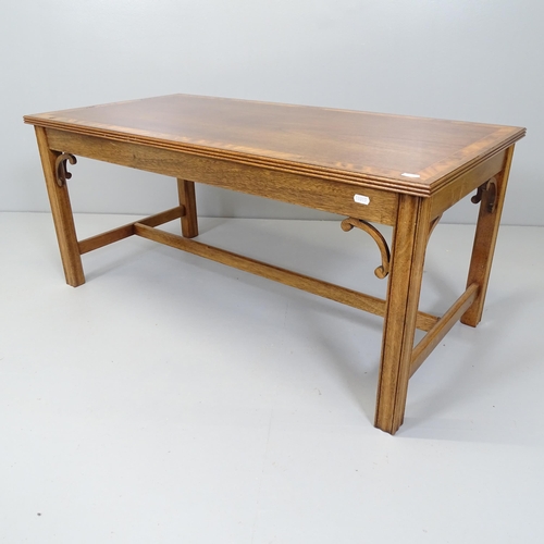 2674 - Am antique cross-banded mahogany coffee table with inlaid decoration, 102x46x51cm, and a modern glas... 