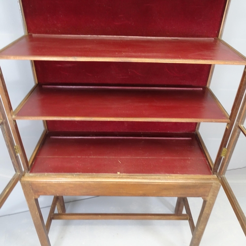 2655 - An antique mahogany two-section shop display cabinet on stand, with two fixed shelves. 103x175x43cm.