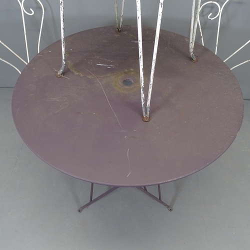 2661 - A painted metal folding circular-topped garden table, 96x75cm and four painted wrought metal stackin... 