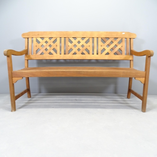 2666 - A stained teak garden bench. 146x87x64cm.