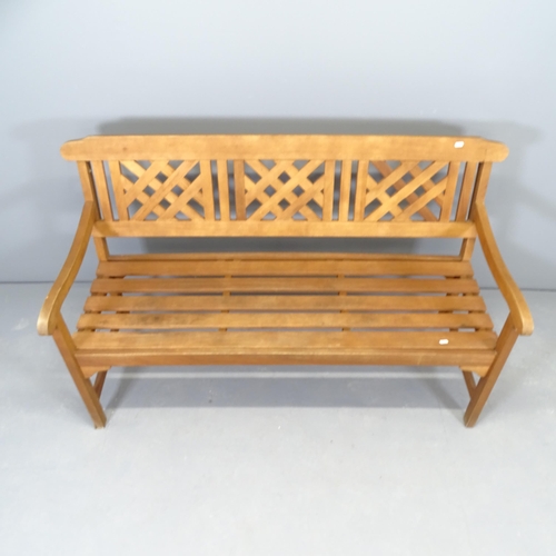 2666 - A stained teak garden bench. 146x87x64cm.