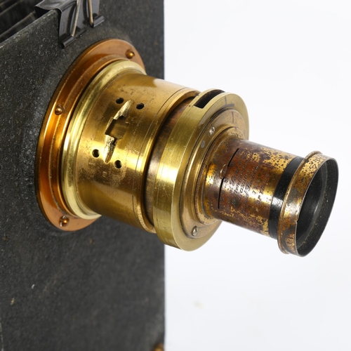 13 - A Victorian painted and brass-mounted magic lantern, with bellow slide, H34cm, base L30cm