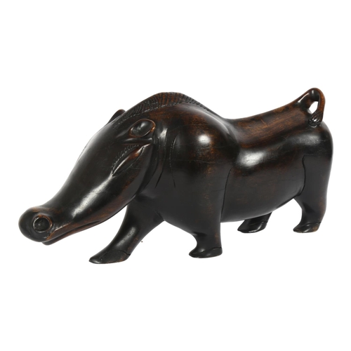 2 - An African stylised carved hardwood sculpture of a warthog, L53cm, H27cm