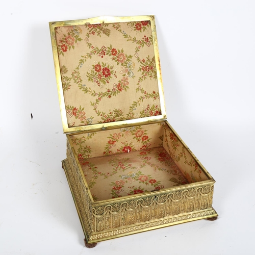 21 - An ornate French gilt-metal casket, circa 1900, central hand painted ivorine panel depicting 2 lover... 