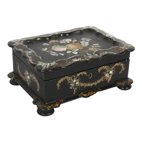 22 - A Victorian papier mache jewel box with inlaid mother-of-pearl decoration, width 25cm