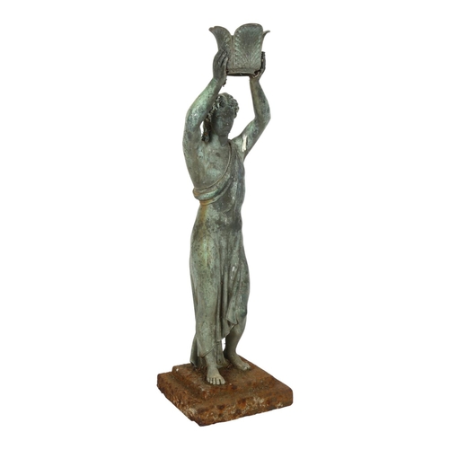 26 - A verdigris bronze figure of a Grecian lady, on cast-iron stepped plinth base, H57.5cm