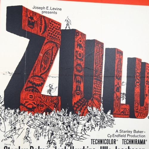 30 - Joseph E Levine Presents Zulu, a Stanley Baker Production, a British quad film poster, mounted on a ... 