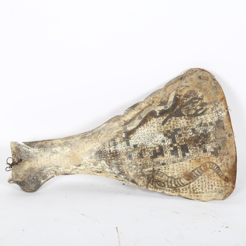 63 - A bone scapula scrimshaw, L31cm