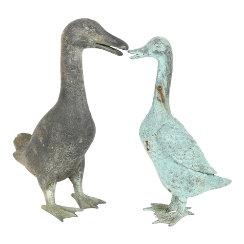 7 - A verdigris bronze duck, H34cm, and a verdigris metal duck, H37cm