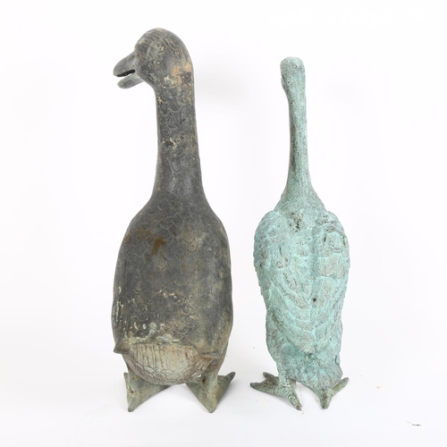 7 - A verdigris bronze duck, H34cm, and a verdigris metal duck, H37cm