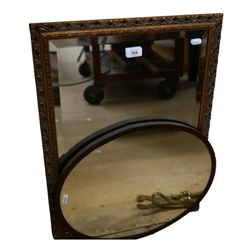 104 - A pierced gilt-framed bevel-edge wall mirror, and a mahogany-framed oval wall mirror