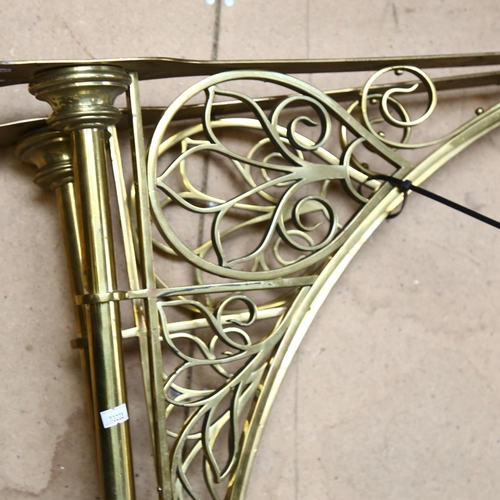 106 - A pair of large brass Art Nouveau wall brackets, 76 x 50cm