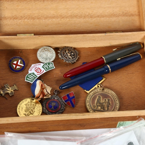 128 - A collection of 10 military aircraft pin badges, to include a Junker JU-88A, a Douglas Dakota, a B-2... 