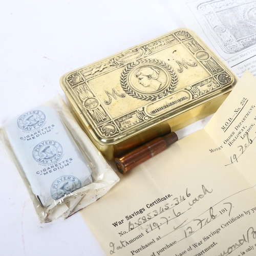 140 - A First World War Period Queen Mary 1914 Christmas tin, together with a War Savings Certificate date... 