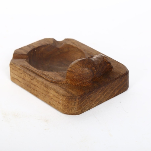 149 - ROBERT MOUSEMAN THOMPSON - an oak ashtray with carved mouse, W10cm