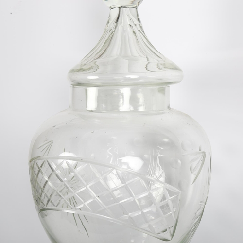 160 - A large cut-glass water urn and cover, H76cm