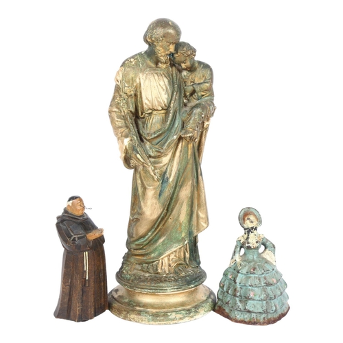 185 - A painted plaster religious group, figure and child, H32cm, a cast-iron crinoline lady, and a carved... 