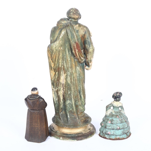 185 - A painted plaster religious group, figure and child, H32cm, a cast-iron crinoline lady, and a carved... 