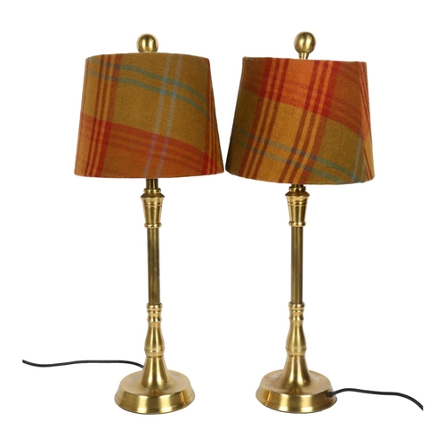 192 - A pair of brass table lamps and shades, H63cm