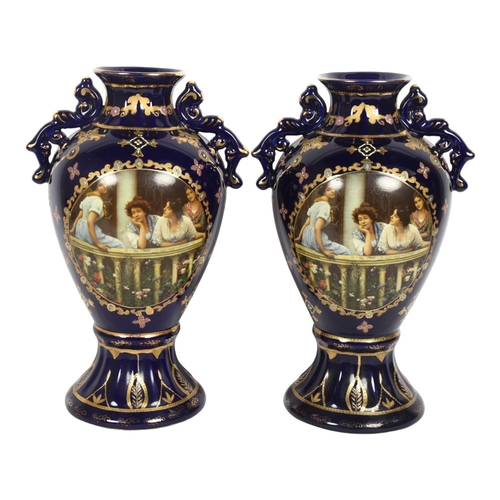 199 - A pair of Royal Limoges cobalt blue 2-handled baluster vases with portrait panels, H35cm