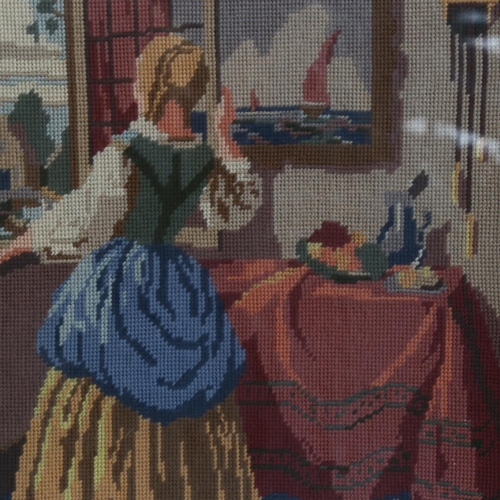 207 - 2 similar needlepoint pictures of Dutch interiors, in a Vintage wooden frame, depicting household sc... 