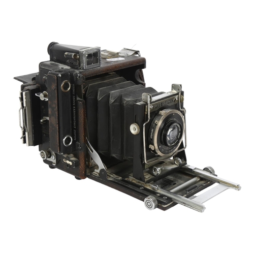 223 - F.Deckel-Munchen, a Compur Speed Graphic folding camera, with a Kalart Sychronised Rangefinder