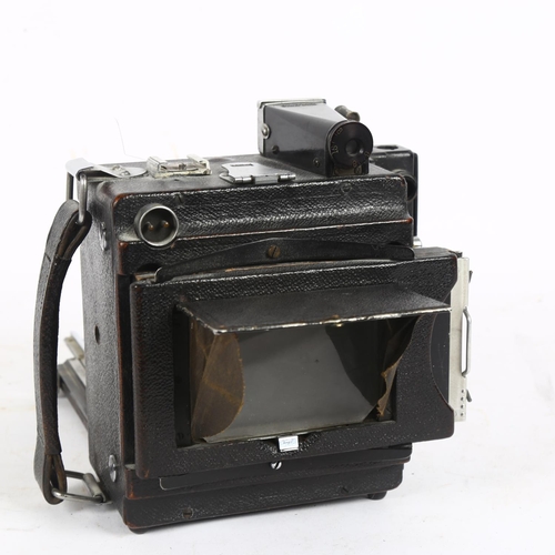 223 - F.Deckel-Munchen, a Compur Speed Graphic folding camera, with a Kalart Sychronised Rangefinder