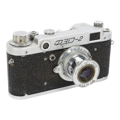 228 - Fed 2 35mm Rangefinder camera, no. 161778, and a Fed 1:35 F=50MM lens, no. 289008