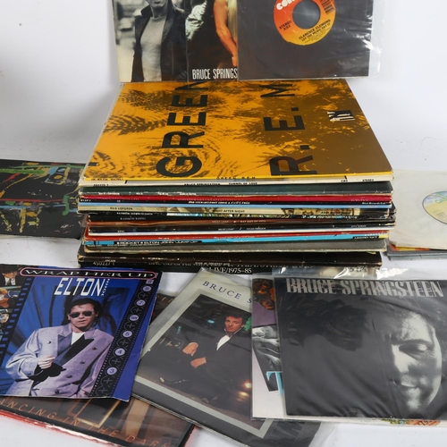 233 - A quantity of vinyl LPs and 7