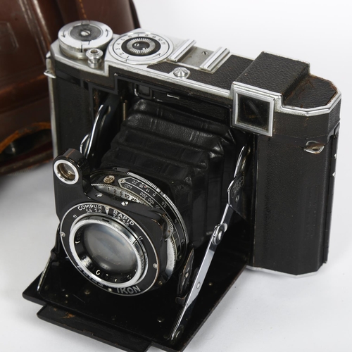 235 - CARL ZEISS - an Ikon Super Ikonta 532/16 folding rangefinder camera, with original carry case